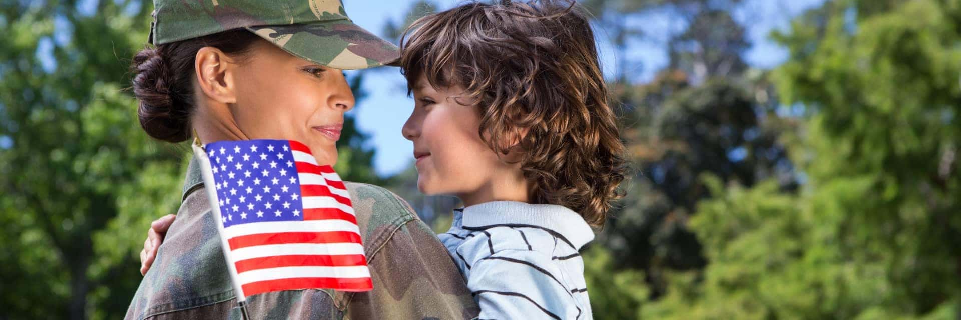 military mom holding son