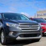 New & Used Ford Escape Inventory parked outside Bill Brown Ford Dealership in Livonia, MI 48150