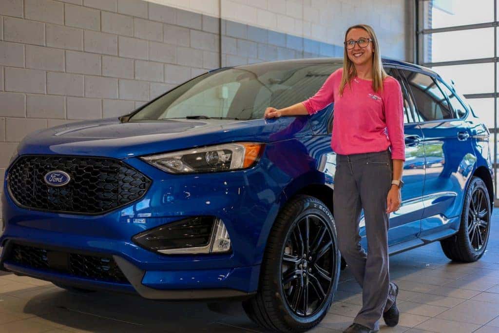 Bill Brown Ford customer in front of her new 2022 Edge ST in