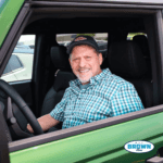 Bill Brown Ford Customer in new Ford Bronco driving off the lot