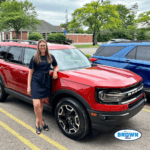 Bill Brown Ford Customer in front of her new Bronco Sport