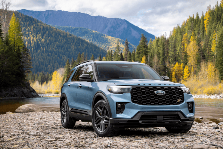 2025 Ford Explorer parked outside near water and fall landscapes