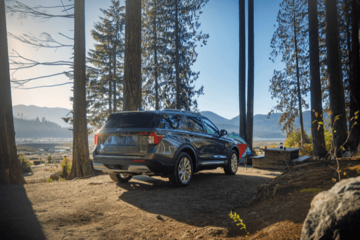 2025 Ford Explorer outside at a camping site in the woods