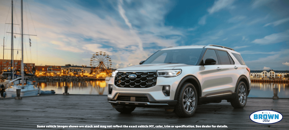 2025 Ford Explorer on a pier with a fairs wheel in the background