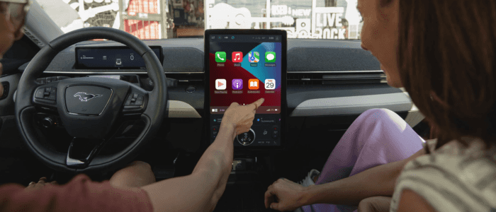 Person using the 15-5-inch touchscreen with SYNC® 4A in the 2025 Ford Mustang Mach-E®