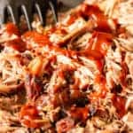 Pulled pork is prepared on the grill