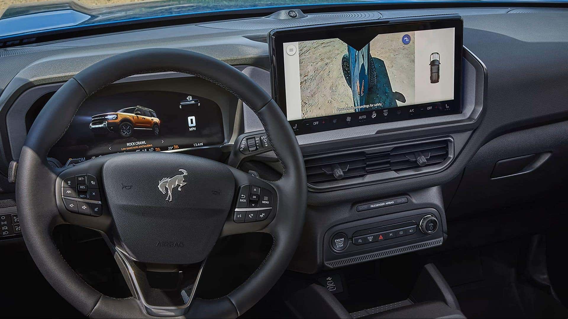 an interior view of the infotainment system and the buttons