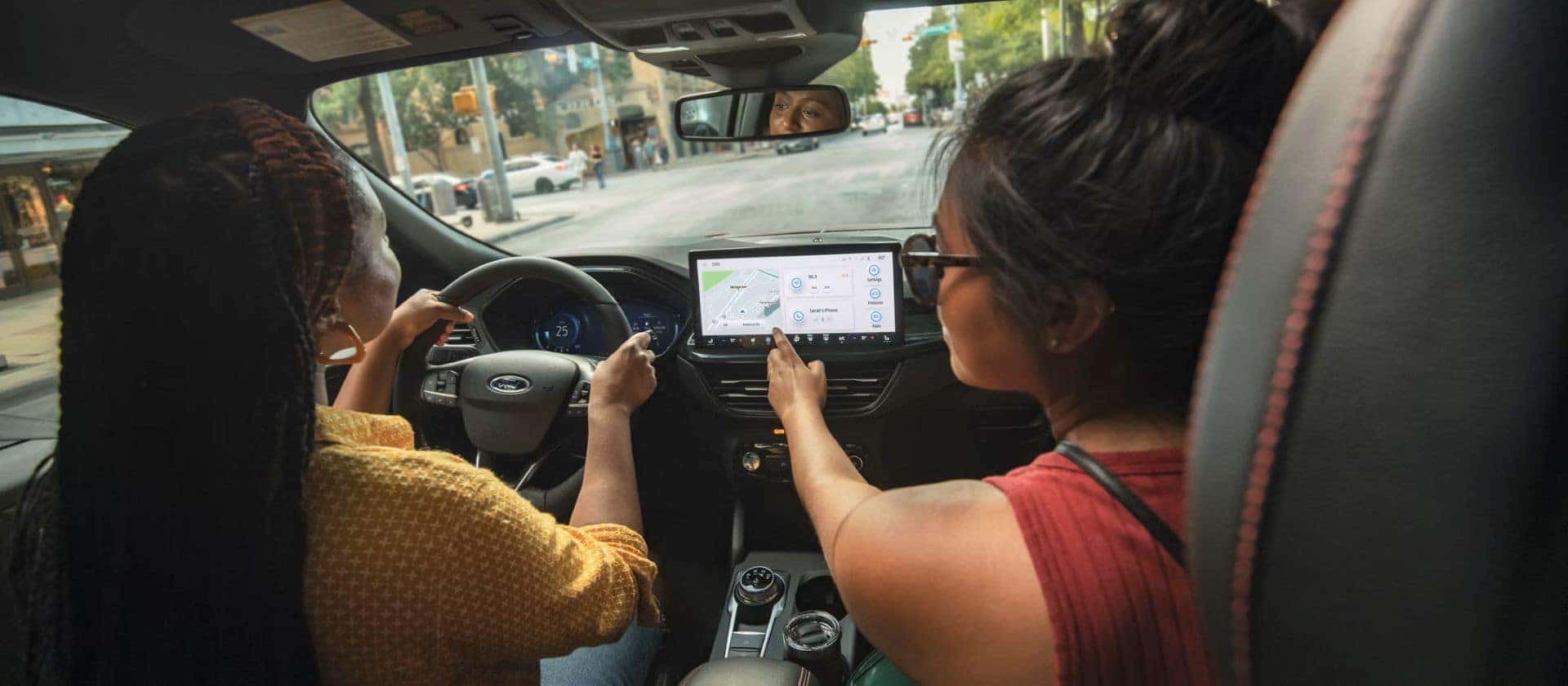 an interior view of the 2026 ford escape with passengers 