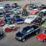 A group of Ford's 'Rouge 100 Vehicles' is shown in a parking lot at one of the local car dealers.