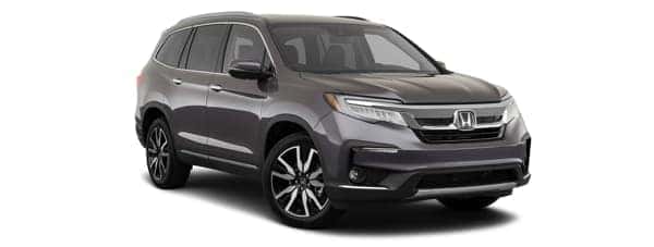 A grey 2020 Honda Pilot is facing right.