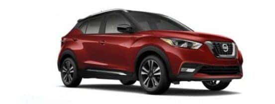 A red 2020 Nissan Kicks is angled right.