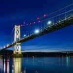 Mid Hudson Bridge lit up across the Hudson river near Poughkeepsie, NY