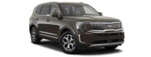 A brown 2020 Kia Telluride is parked on a white background.