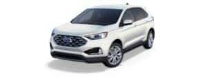 A white 2020 Ford Edge Titanium is angled left.