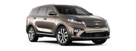 A tan 2019 Kia Sorento is angled right.