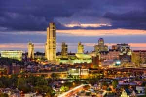 A lit view of a busy night skyline in Albany NY