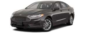 A black 2020 Ford Fusion is angled left.