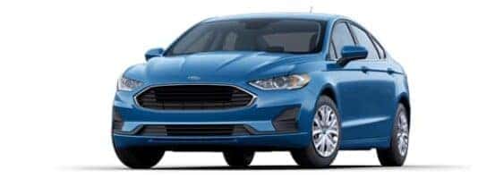A blue 2020 Ford Fusion S is angled left.