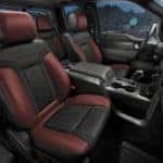 The red and black interior is shown in the 2014 Ford Raptor, from a Ford dealer near Troy.