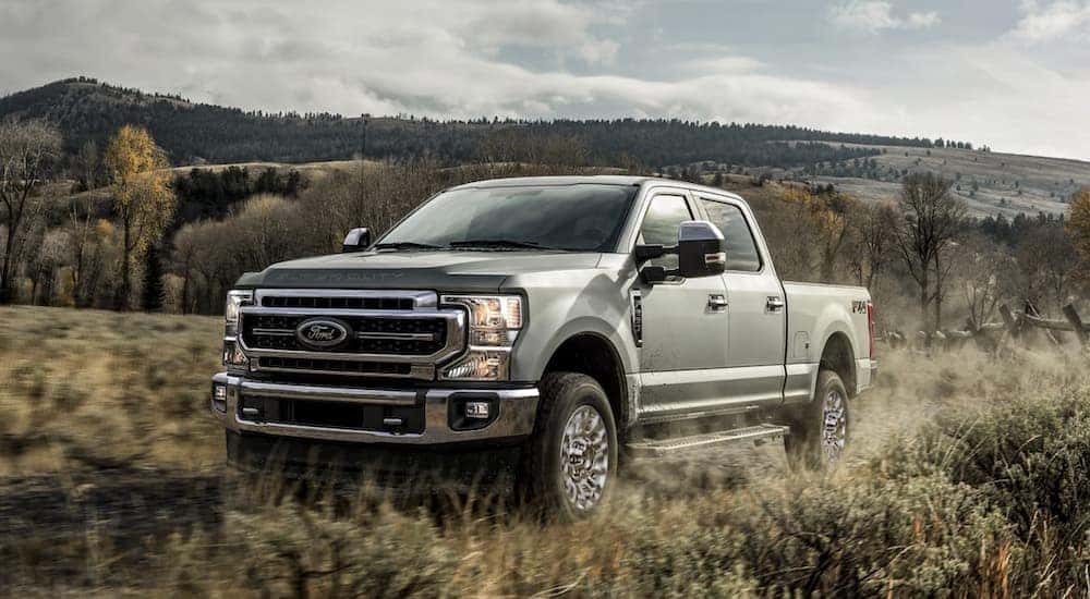 Silver 2020 Ford F-250 Super Duty leaving a Ford diesel truck dealer.