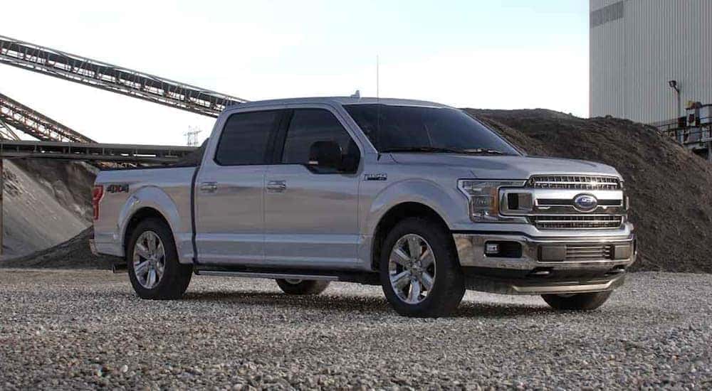 A grey 2020 Ford F-150 is shown parked from the side after leaving a Schenectady used Ford dealer.