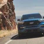 A blue 2021 Ford Explorer ST is shown from the front.