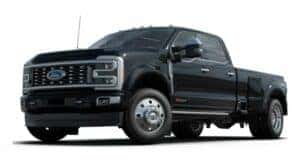 A black 2023 Ford F-450 Super Duty Limited is angled left.