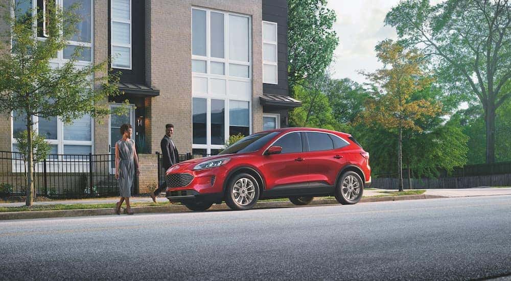 A red 2022 Ford Escape is shown from the side.