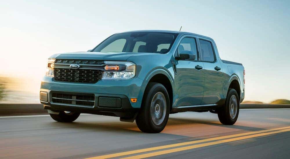 A grey 2022 Ford Maverick is shown from the front at an angle after leaving a dealer that sells used Ford trucks near me.