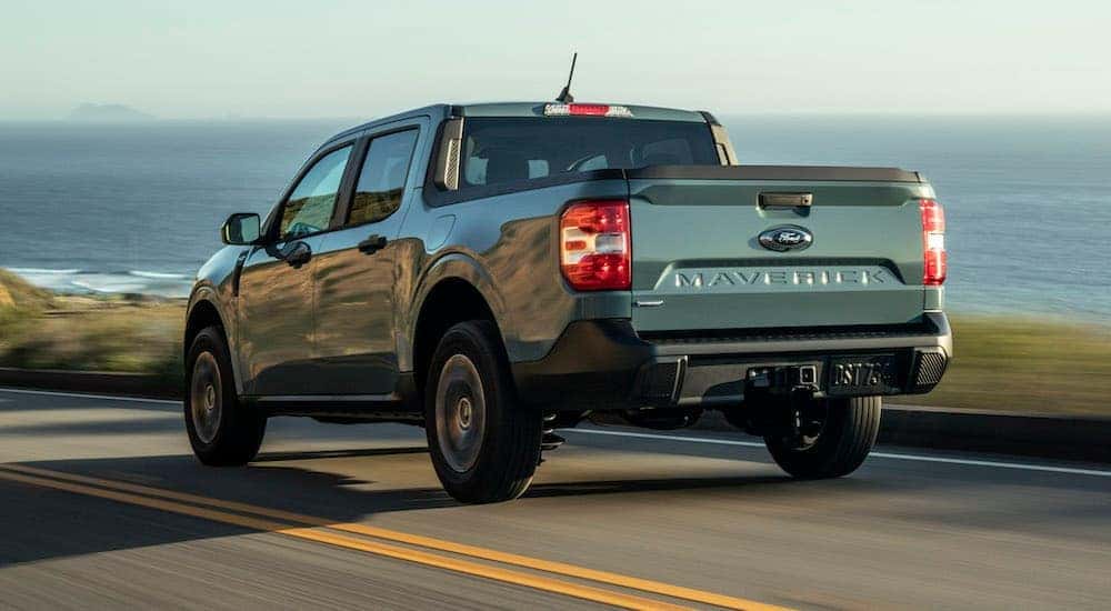 A grey 2022 Ford Maverick is shown from the rear at an angle.