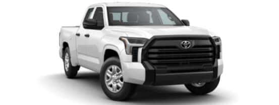 A white 2023 Toyota Tundra is shown angled right.