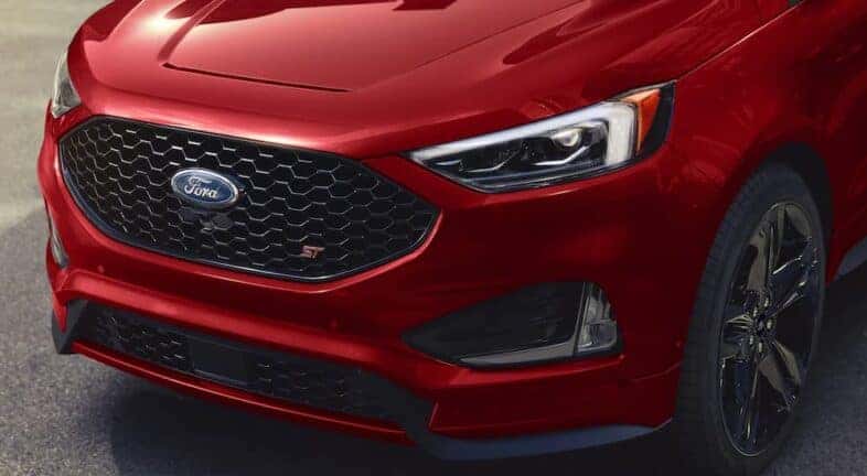 A close up of the front of a red 2022 Ford Edge ST is shown.