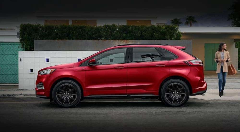 A red 2023 Ford Edge is shown parked on a street after visiting a DePaula Ford Edge dealer