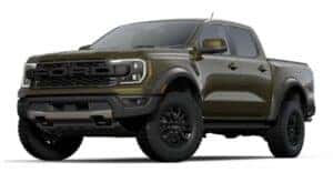 A green 2024 Ford Ranger Raptor is angled left.