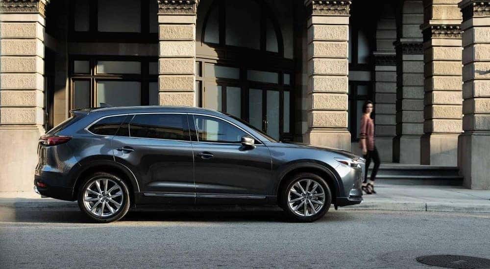 A grey 2019 Mazda CX-9 is shown from the side after looking at used cars for sale in Albany.