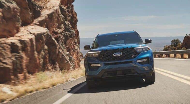 A blue 2023 Ford Explorer ST is shown from the front after leaving a Ford dealership near Bennington, VT.