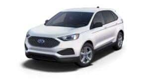 A white 2024 Ford Edge is angled left.
