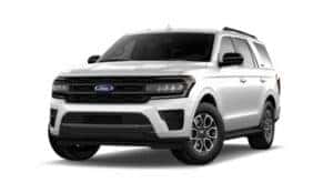 A white 2024 Ford Expedition is angled left.