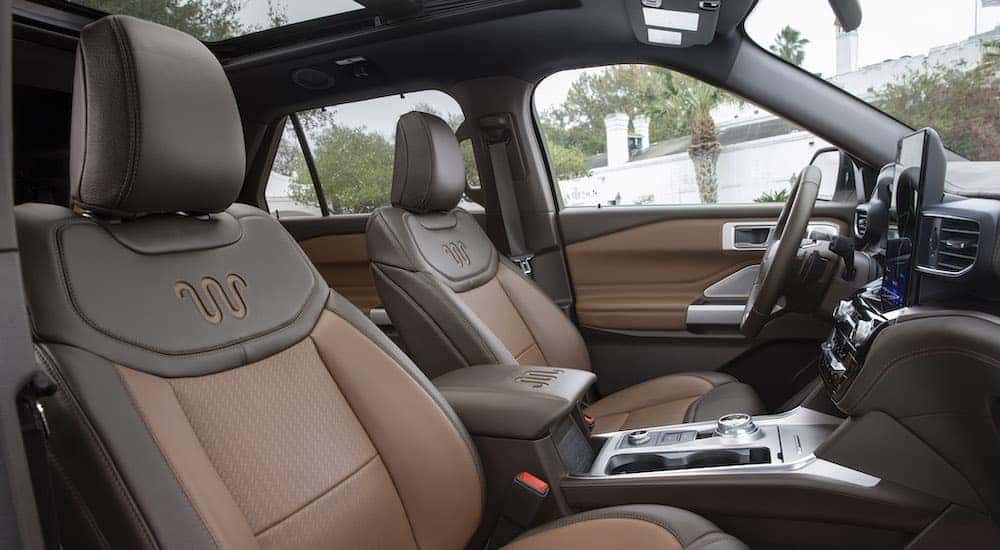 The interior of a 2021 Ford Explorer King Ranch is shown from the passenger side.