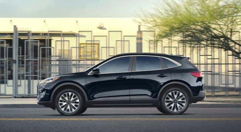 A black 2022 Ford Escape is shown from a side angle after visiting a used Ford dealership near Mechanicville.