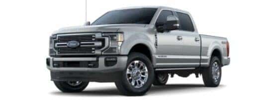 A grey 2024 Ford F-350 Limited is shown angled left.