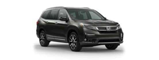 A black 2024 Honda Pilot is shown angled right.