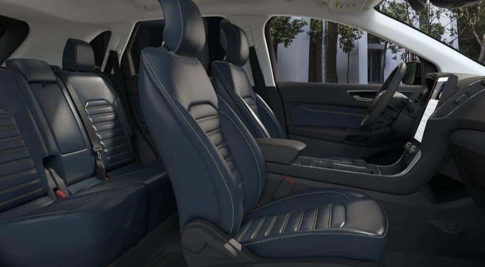 The navy blue leather seating in a 2023 Ford Edge Adventure.