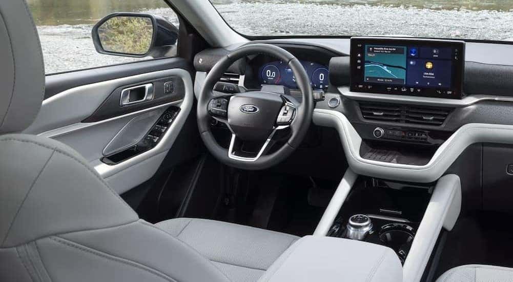 The black and white interior and dash in a 2025 Ford Explorer is shown.