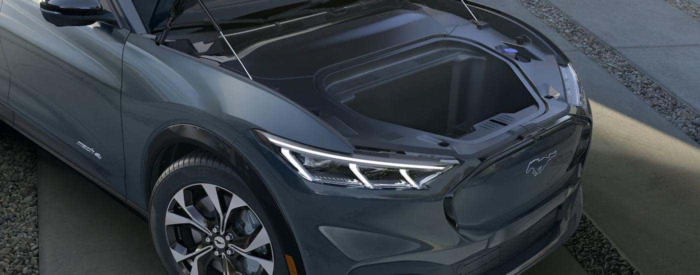 The open frunk on a grey 2023 Ford Mustang Mach-E.