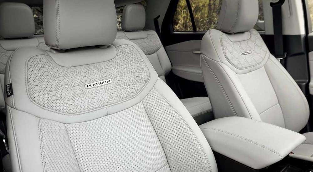The white interior in a 2025 Ford Explorer Platinum is shown.
