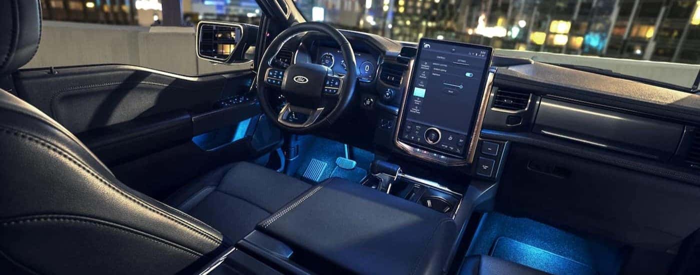 The black interior and dash in a 2022 Ford F-150 Lightning is shown.