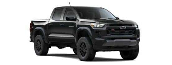 A black 2024 Chevy Colorado Trail Boss is angled right.