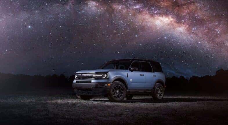 A blue 2024 Ford Bronco Sport for sale is shown from the front at an angle.