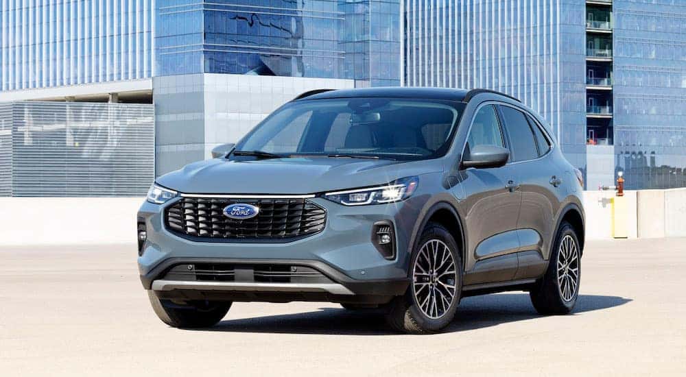 A grey 2025 Ford Escape is shown from the front at an angle.